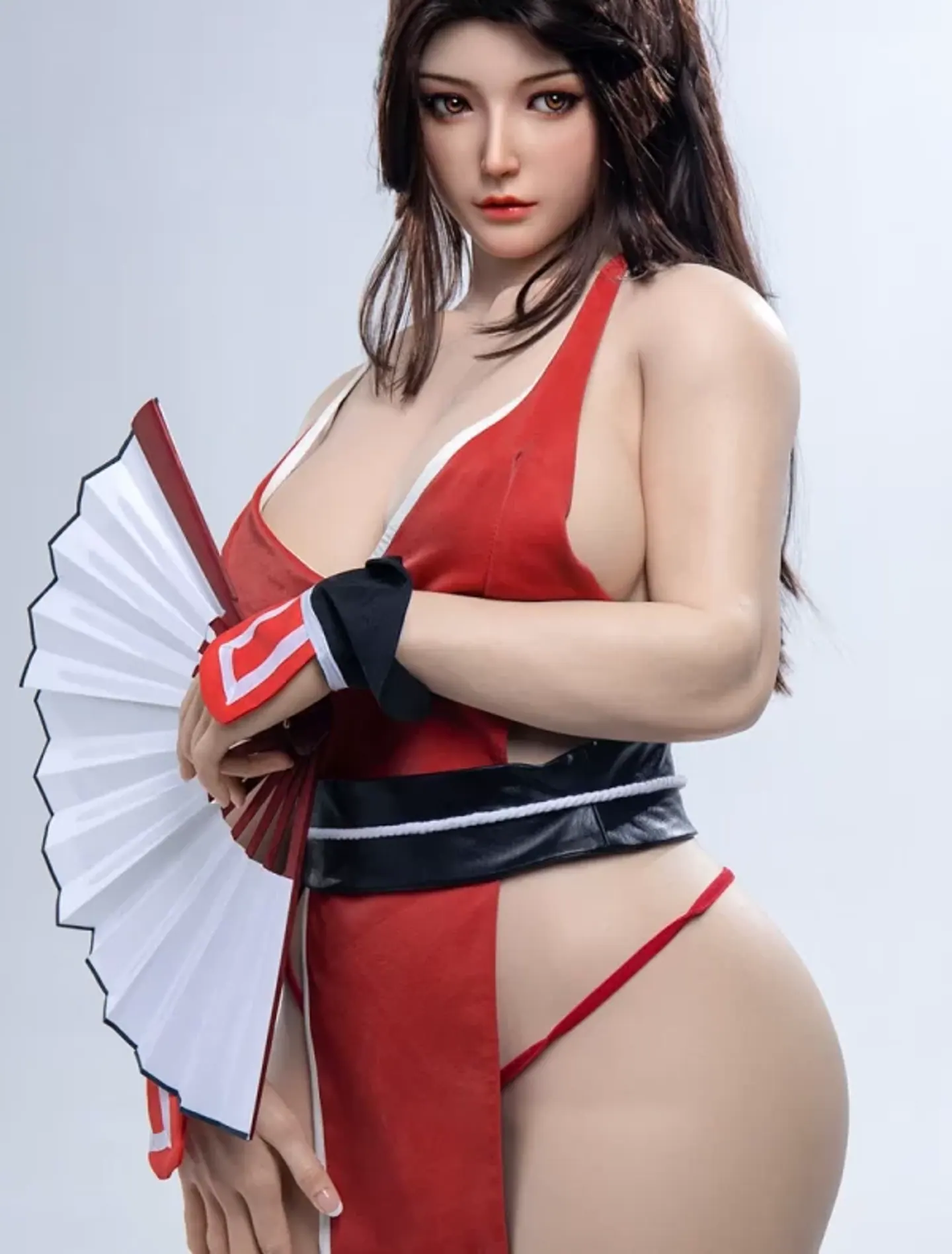 A mature full-silicone adult companion in a red character-inspired outfit